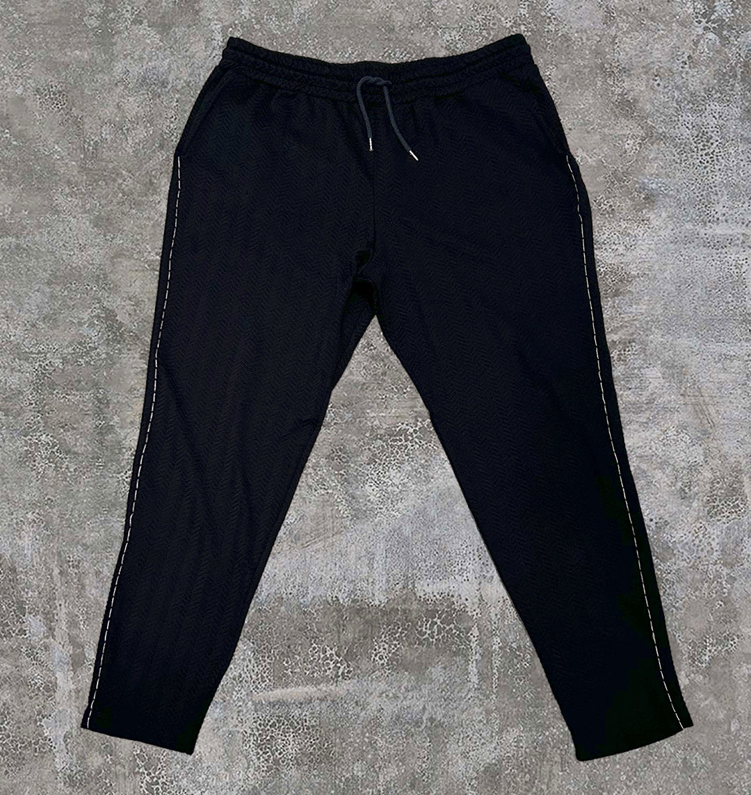 Textured black trousers, upcycled with contrast stitching down the leg