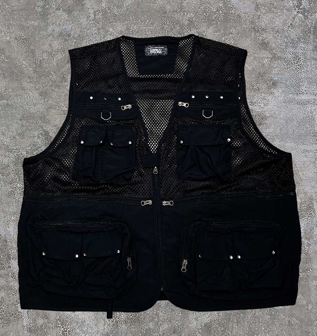 Black lightweight utility vest, hand studded by BRICK + BONE