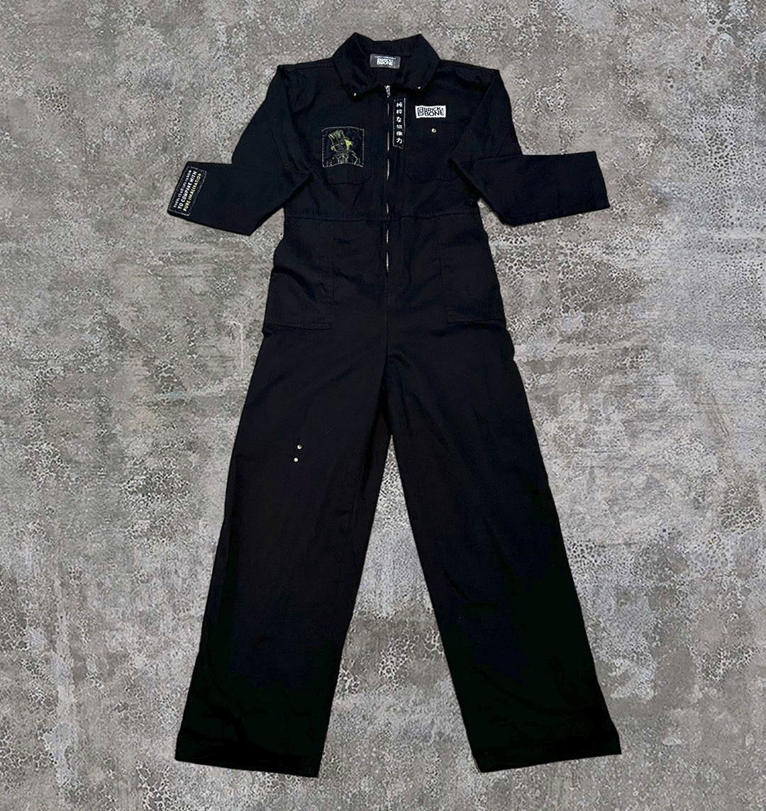 Upcycled black boiler suit with soft velvet patches, with illustrations from willy wonka